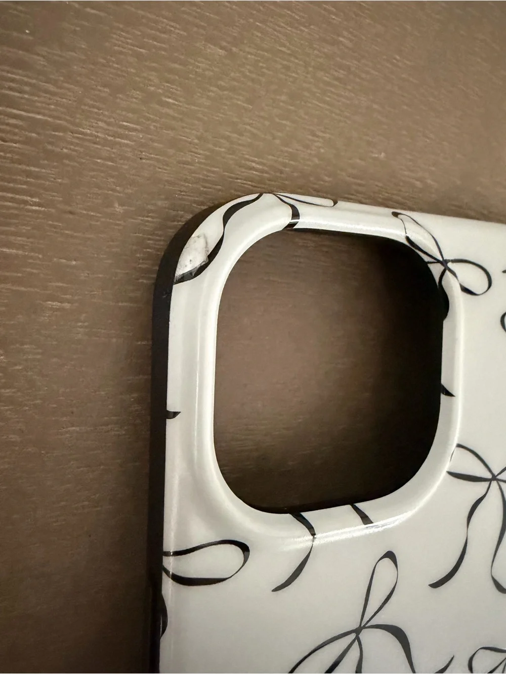 Loopy Case iPhone 14 Plus black and white bow phone case
